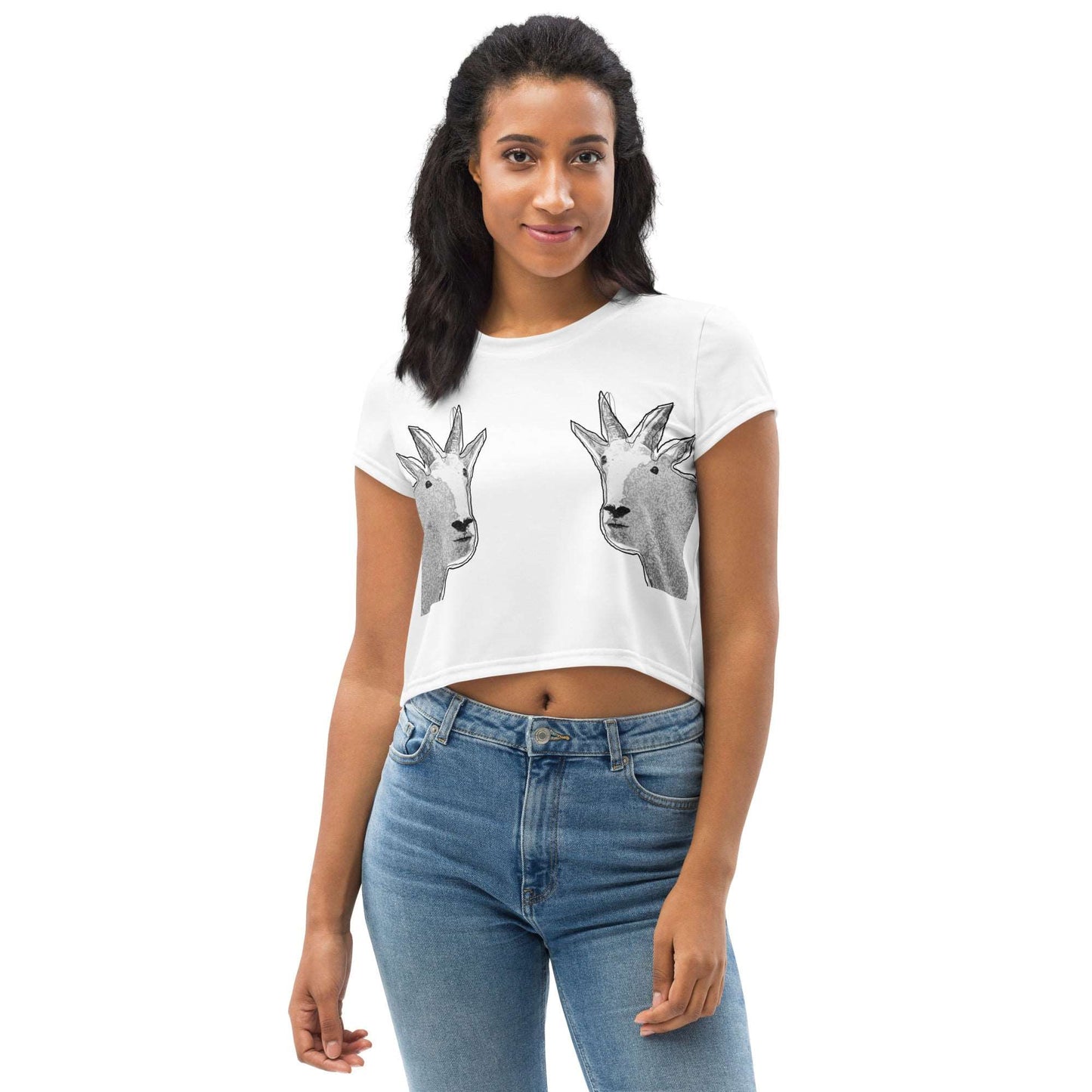 A black female model wearing a white crop top that has two funny mountain goat images on the boobs. designed by North American Mountain Goat Appreciation Club.