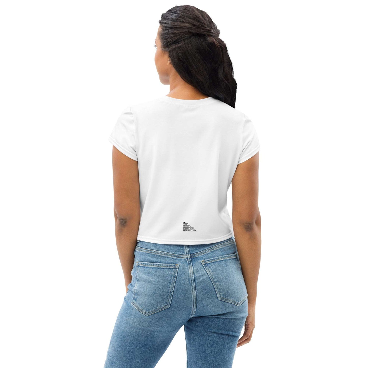 A black female model wearing a white crop top that has two funny mountain goat images on the boobs. designed by North American Mountain Goat Appreciation Club.