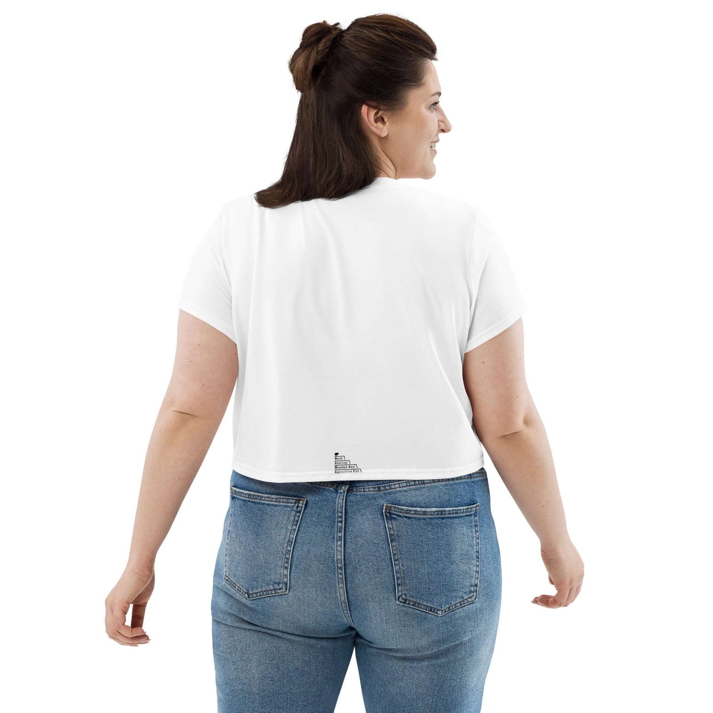 A plus-size female model wearing a white crop top that has two funny mountain goat images on the boobs. designed by North American Mountain Goat Appreciation Club.