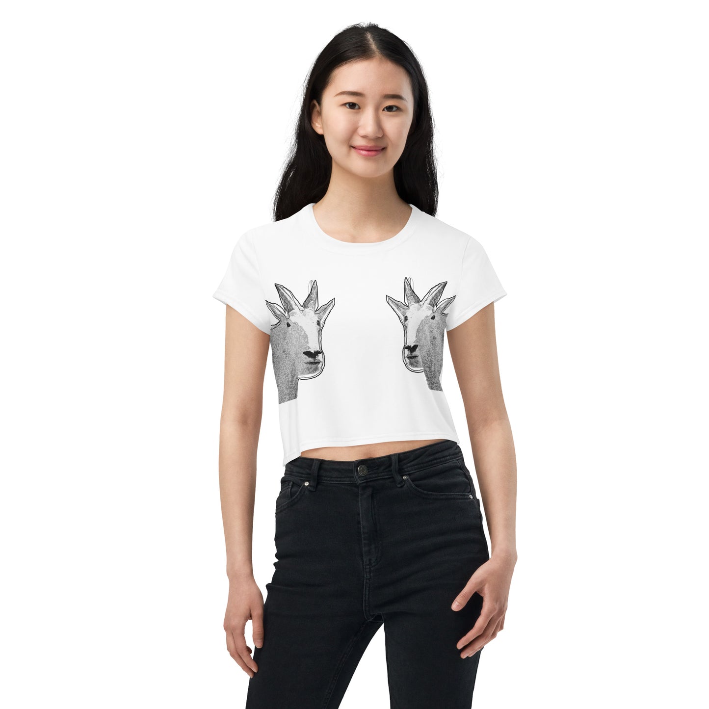 A petite Asian female model wearing a white crop top that has two funny mountain goat images on the boobs. designed by North American Mountain Goat Appreciation Club.