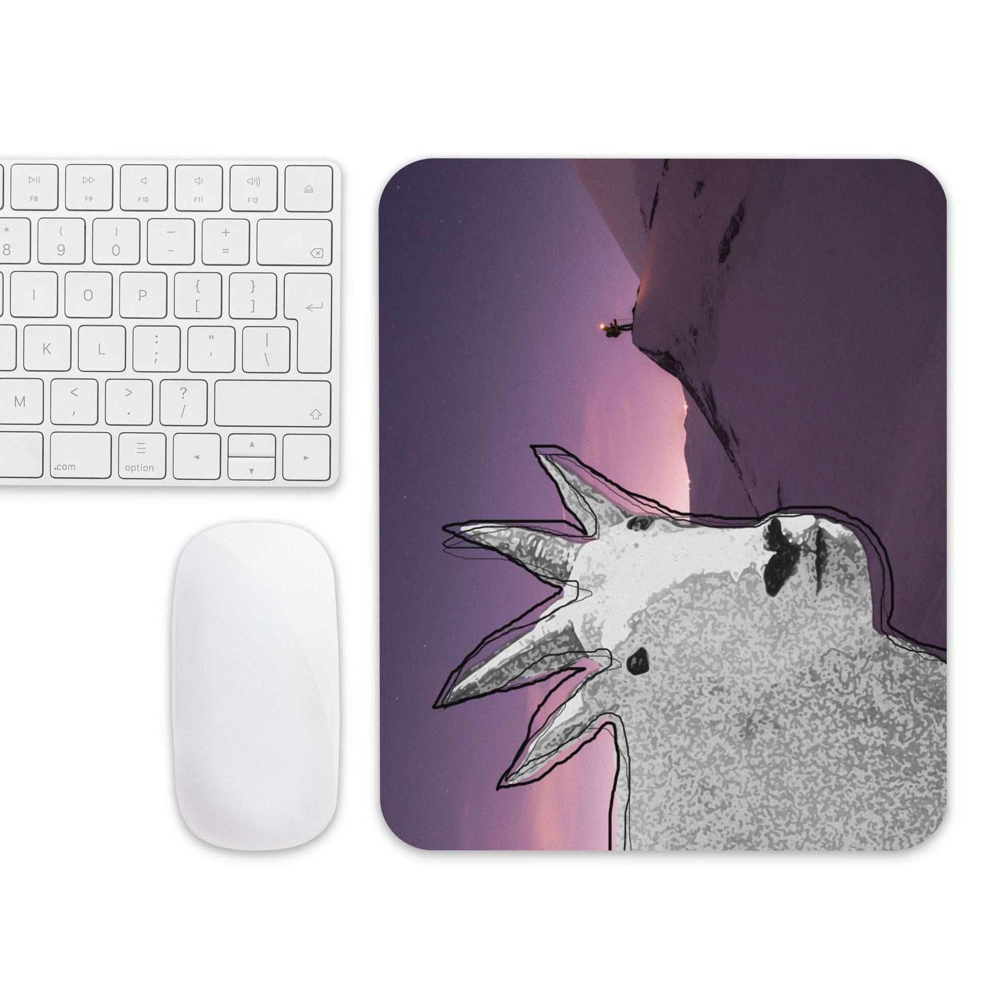 A high-quality mouse pad featuring a funny mountain goat design over purple snowy trek background.