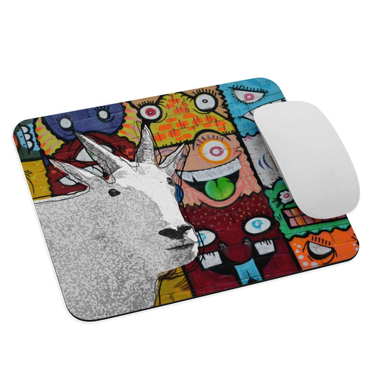 A high-quality mouse pad featuring a funny mountain goat design over a funky street art background.