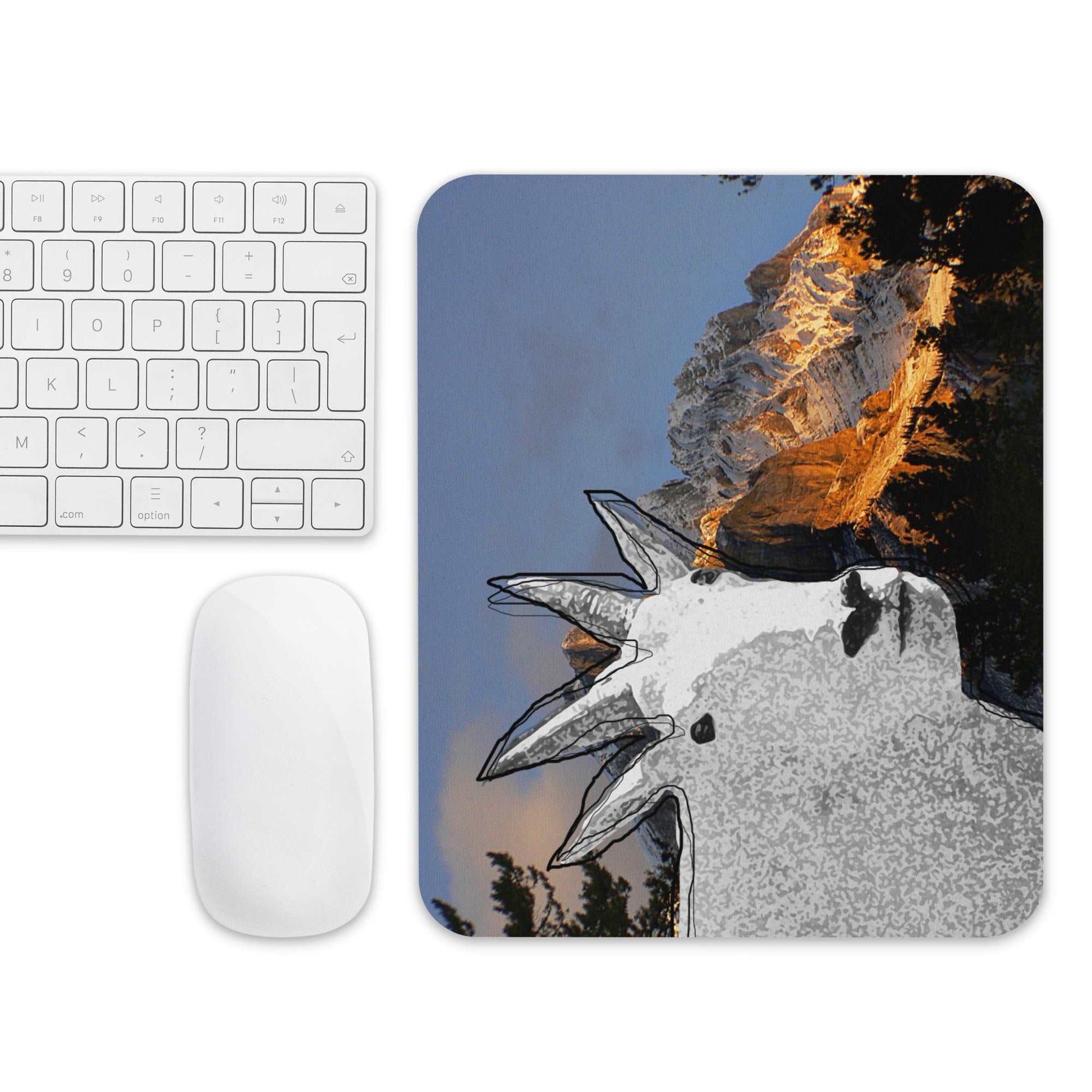 A high-quality mouse pad featuring a funny mountain goat design over a mountain dusk background.