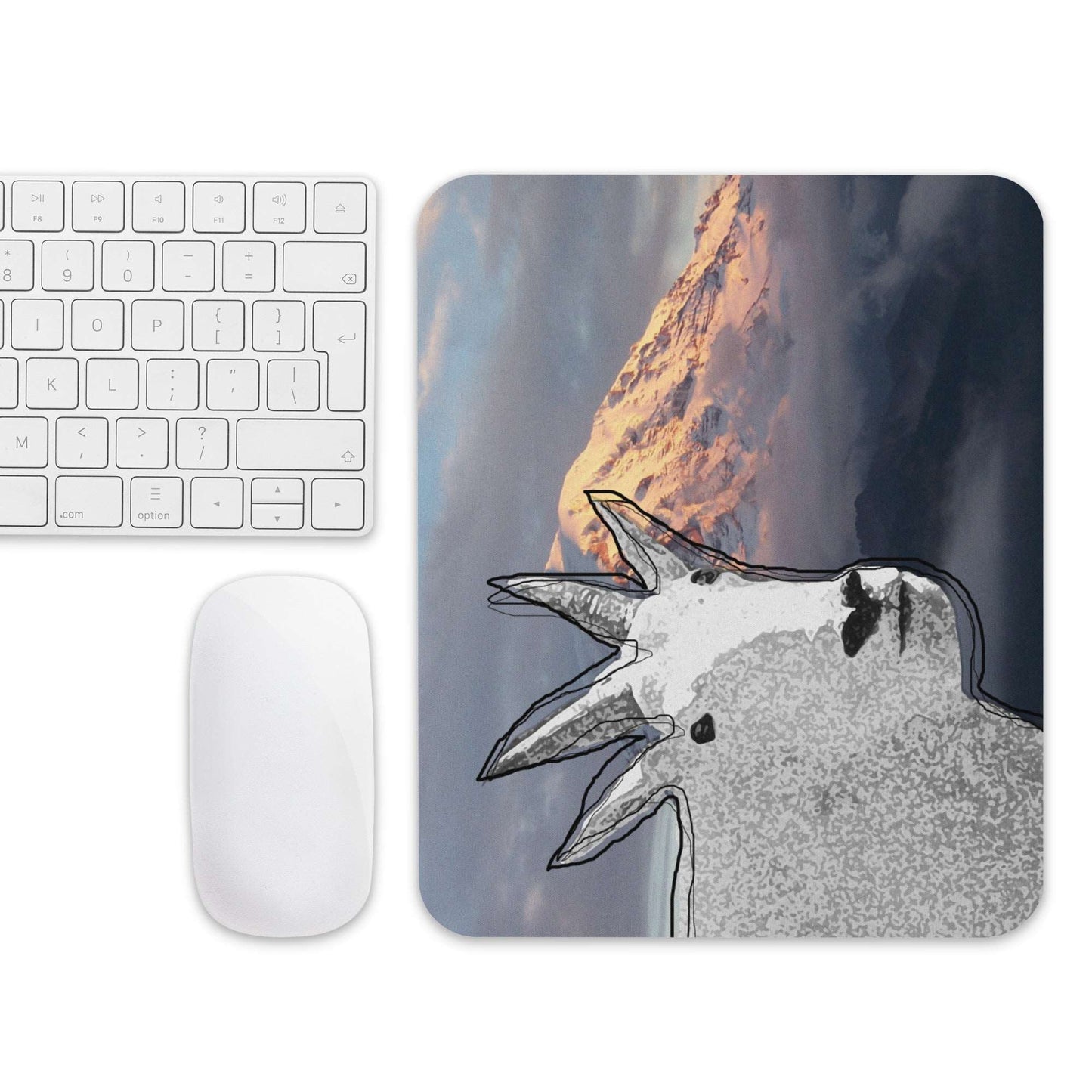 A high-quality mouse pad featuring a funny mountain goat design over a misty mountain background.