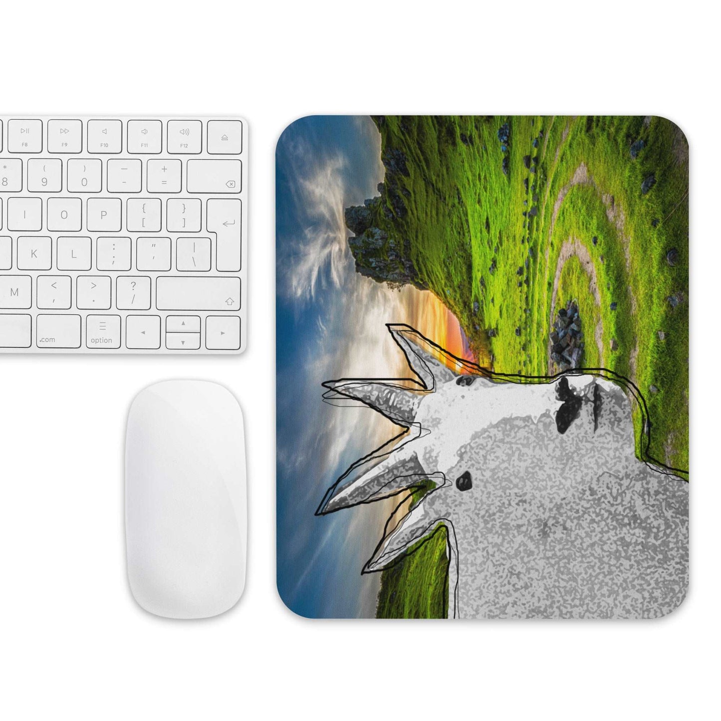 A high-quality mouse pad featuring a funny mountain goat design over a green mountain background.