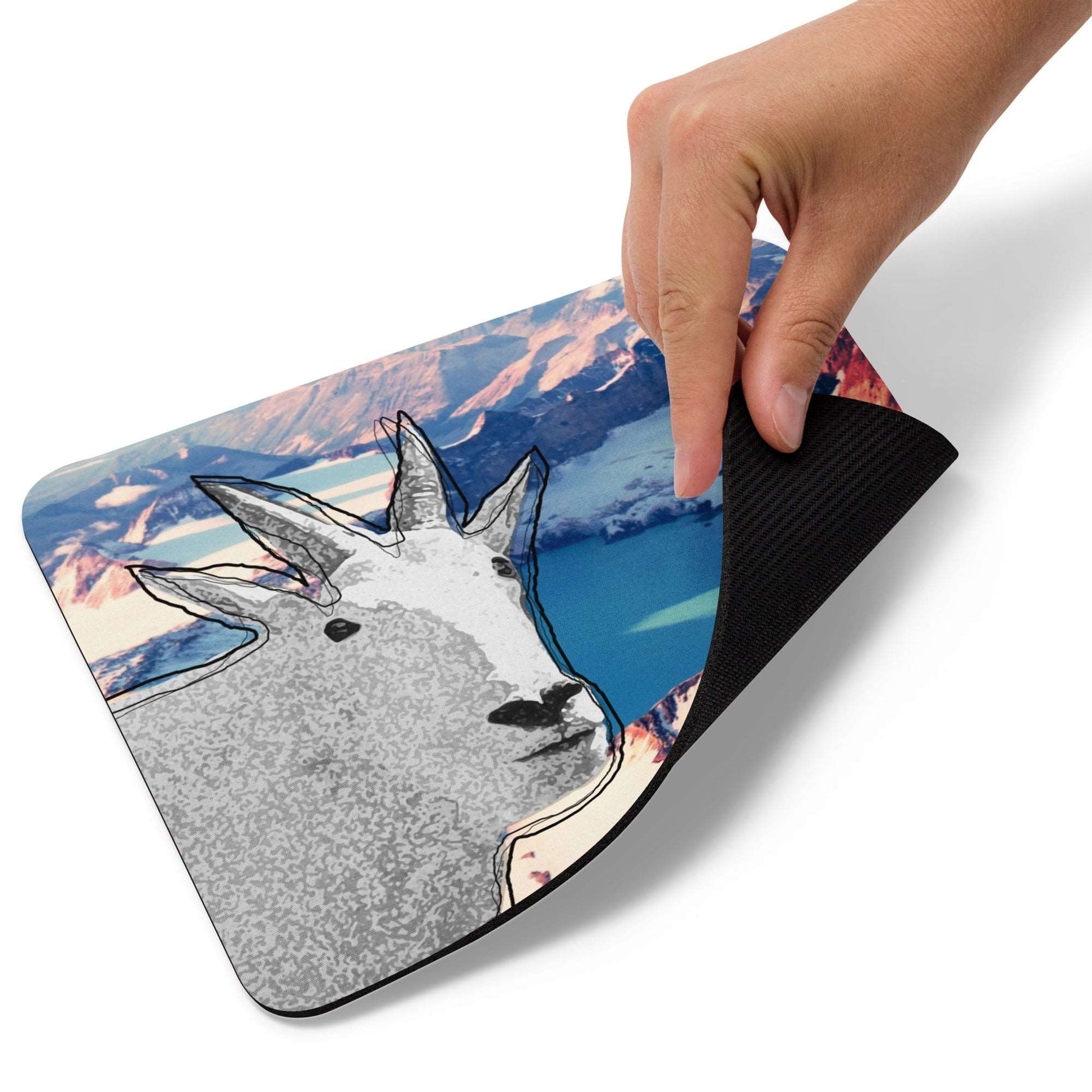 A high-quality mouse pad featuring a funny mountain goat design over a glacier lake background.