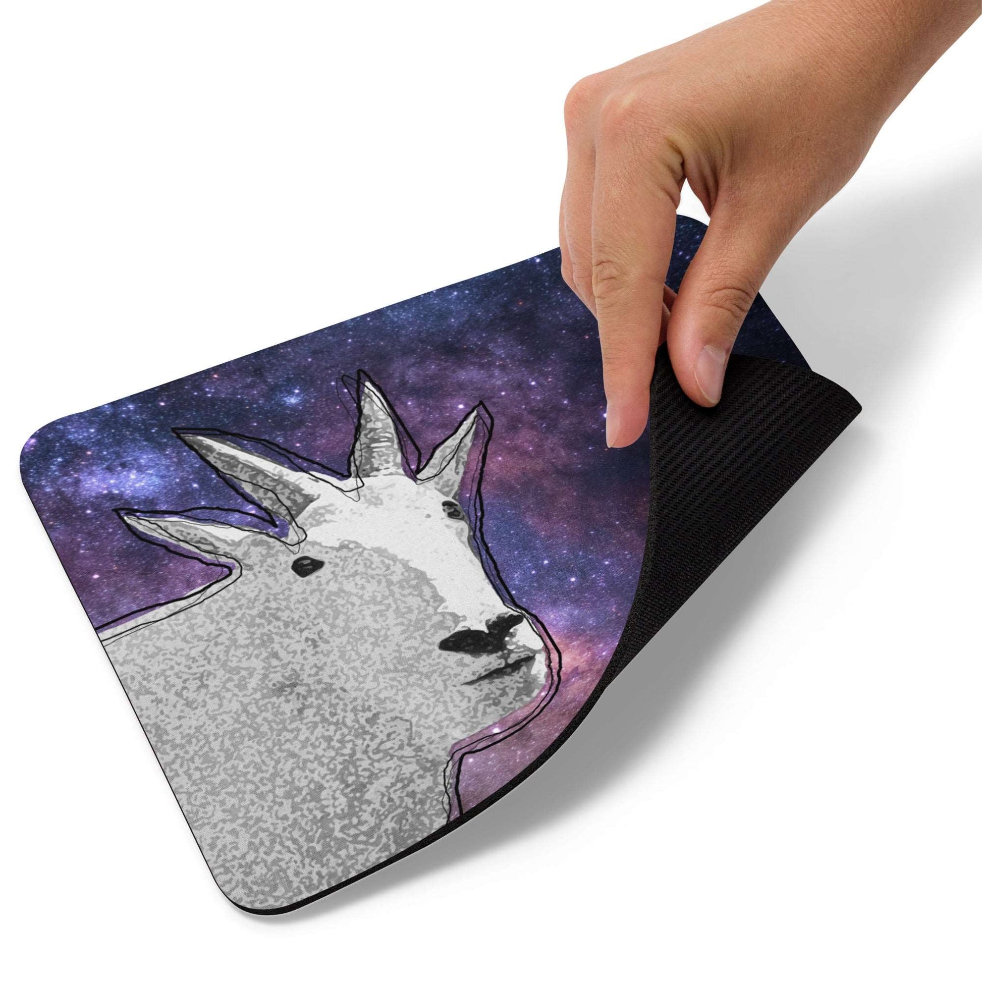 A high-quality mouse pad featuring a funny mountain goat design over a Cosmic background.