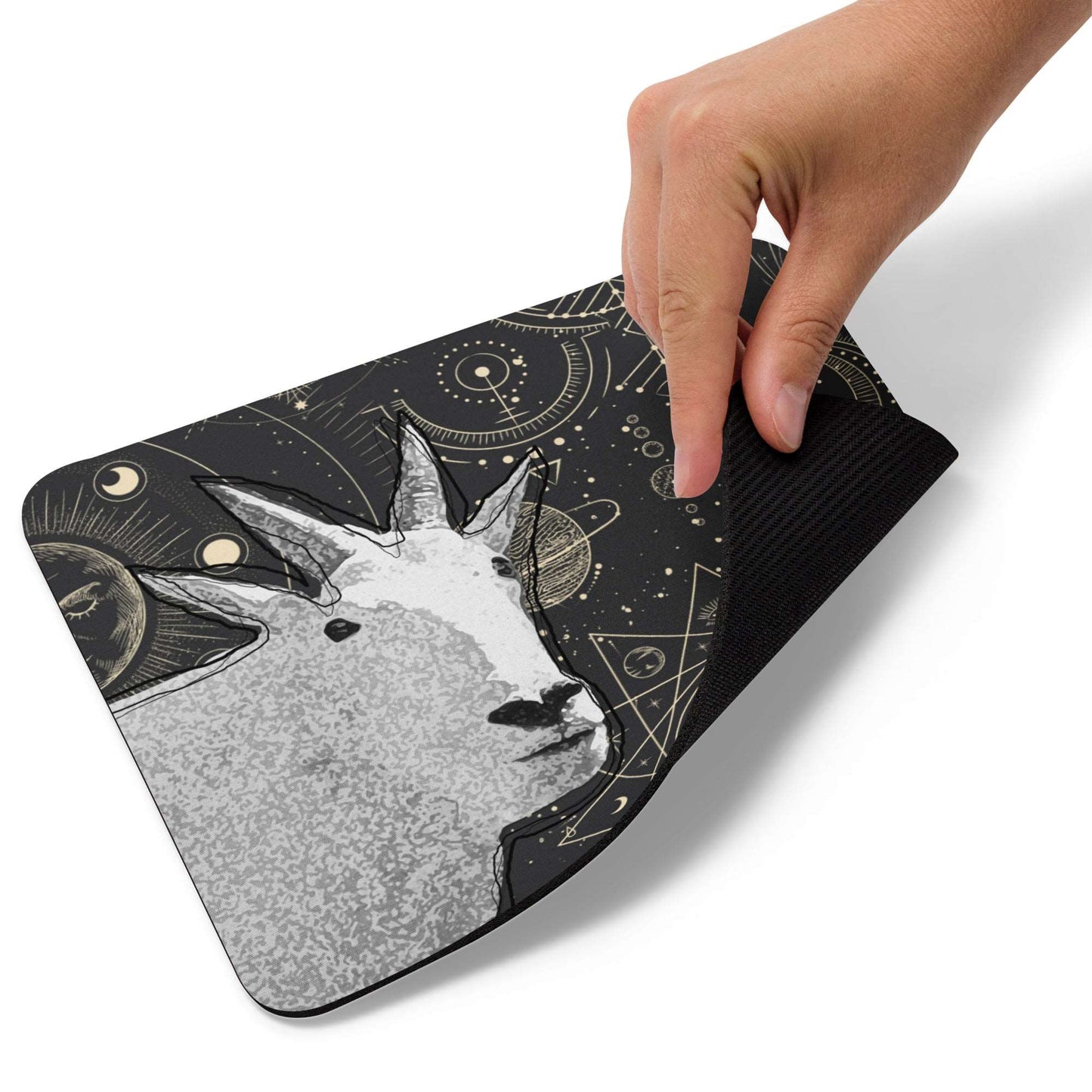 A high-quality mouse pad featuring a funny mountain goat design over an Astrology background.