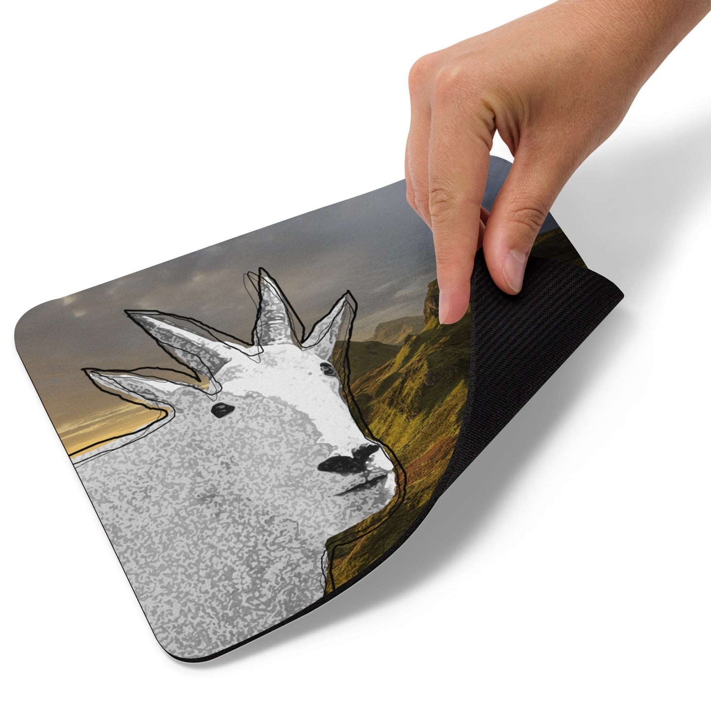 A high-quality mouse pad featuring a funny mountain goat design over a yearning background.