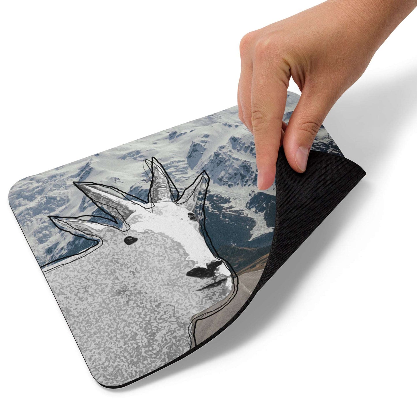 A high-quality mouse pad featuring a funny mountain goat design over a mountain highway background.